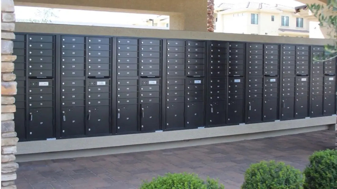 Florence 1570-16 Cluster Box Units installed outside a modern apartment complex - Select Commercial Mailboxes